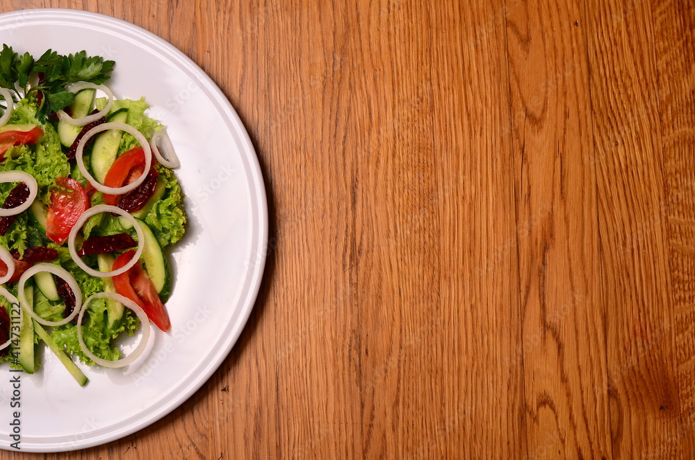 Salad baked eggplant and fresh tomatoes. Top view Salad baked eggplant and fresh tomatoes. Top view