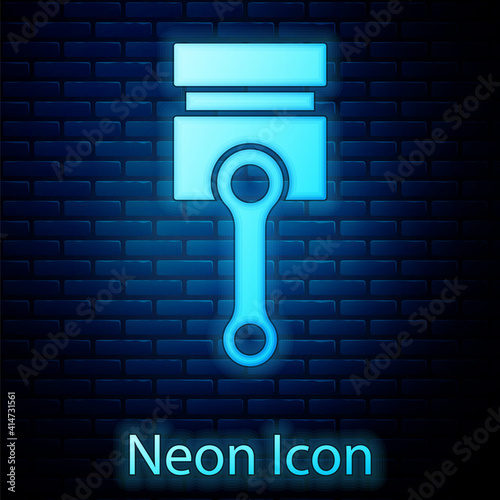 Glowing neon Engine piston icon isolated on brick wall background. Car engine piston sign. Vector.