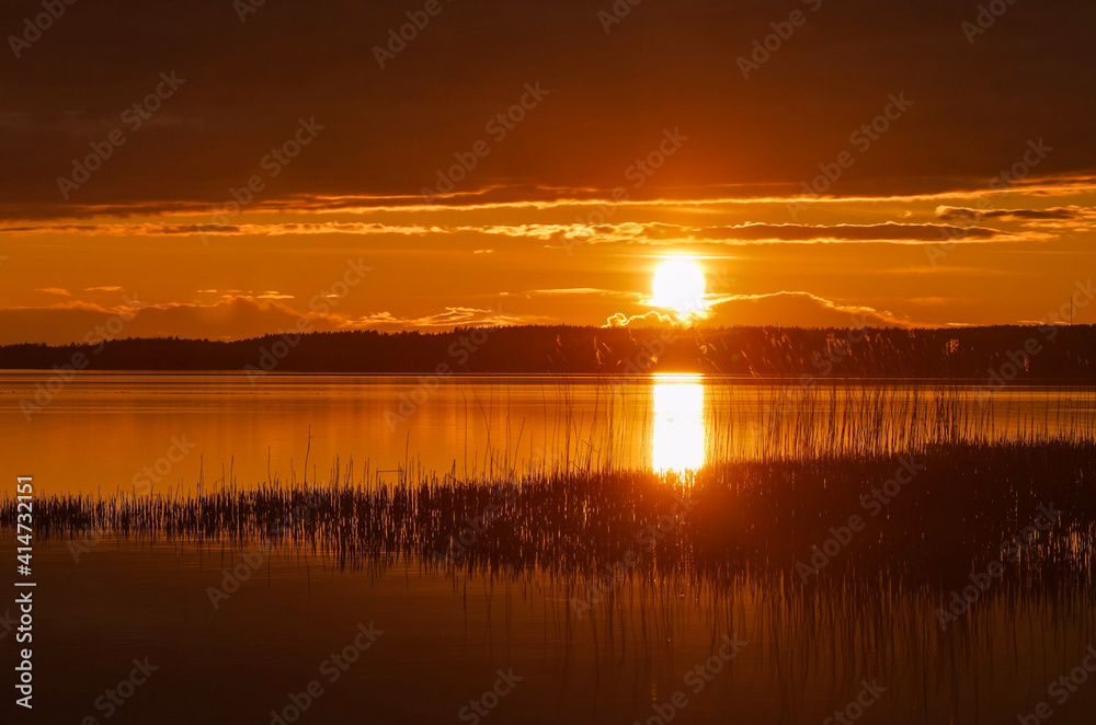Obraz premium sunset over the river
