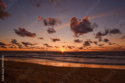 Fototapeta Naklejka Na Ścianę i Meble -  Beautiful sunset on the Baltic sea beach