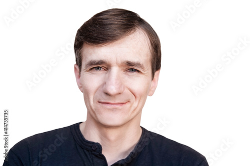 Portrait of a middle-aged man on a white background, isolated. The man smiles sweetly, hoping that God will give him many more years of life