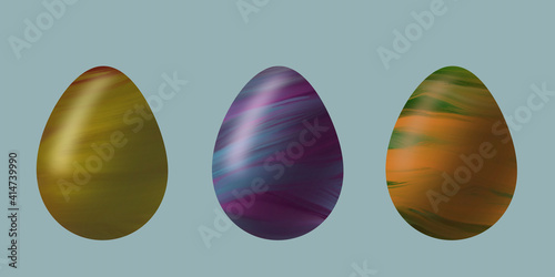three colorful easter eggs in mixed colors on gray-blue background