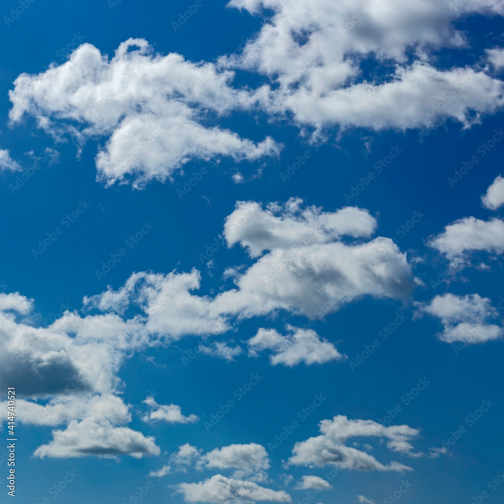 Beautiful blue sky with white clouds as a natural background. Beautiful blue sky with white clouds as a natural background.