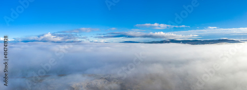 Above the clouds at Portnoo in County Donegal with fog - Ireland © Lukassek