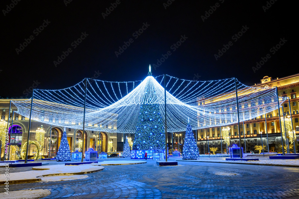 Fototapeta premium New Year and Christmas decorations on Lubyanka square, Moscow, Russian Federation, January 13, 2021