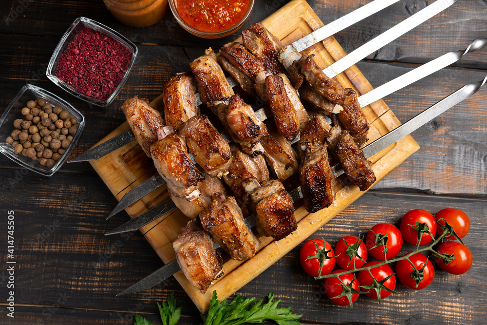 barbecue lamb ribs on cutting board on wooden table