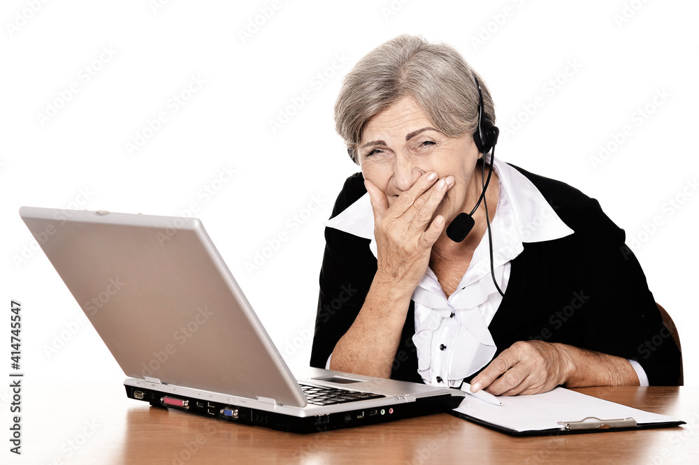 laughing elderly woman working with laptop on white background laughing elderly woman working with laptop on white background