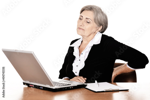 elderly woman working with backache on white background