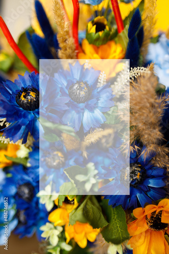 blank for registration of postcards or a gift certificate. Artificial flowers on a colored background © toxicoz