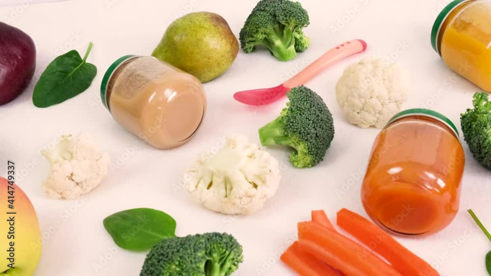 baby puree with vegetables and fruits. selective focus. baby puree with vegetables and fruits. selective focus.