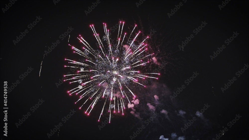 Photographing of salutes and fireworks in the night sky celebrate data. Quadcopter and salute. Powerful fireworks in the night sky. Photographing of salutes and fireworks in the night sky celebrate data. Quadcopter and salute. Powerful fireworks in the night sky.