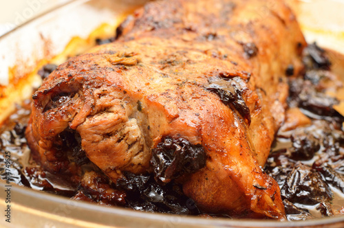 Delicious roast pork loin with plum for christmas dinner.