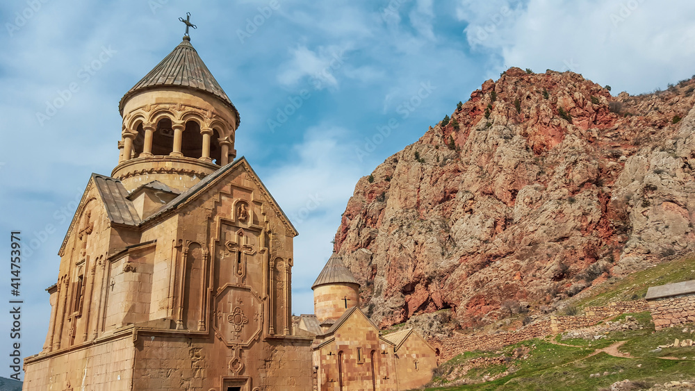 The ancient Noravank Monastery, located near the famous red rocks. Armenia. Horizontal panorama The ancient Noravank Monastery, located near the famous red rocks. Armenia. Horizontal panorama