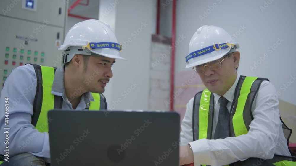 Engineer concept of 4k Resolution. The employee is checking the generator. Engineer concept of 4k Resolution. The employee is checking the generator.