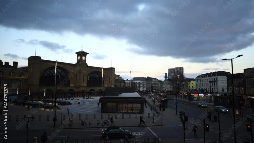 London King's Cross Station time lapse from day to night with clouds moving night city lights London King's Cross Station time lapse from day to night with clouds moving night city lights