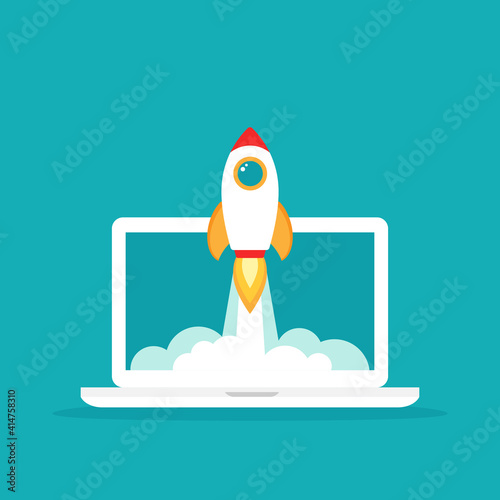 laptop screen with rocket or shuttle flying out. workplace on blue background.