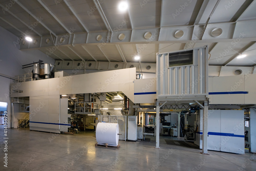 Big warehouse with paper rolls and printing material Big warehouse with paper rolls and printing material