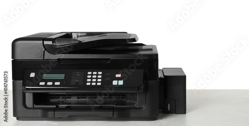 New modern multifunction printer on light table