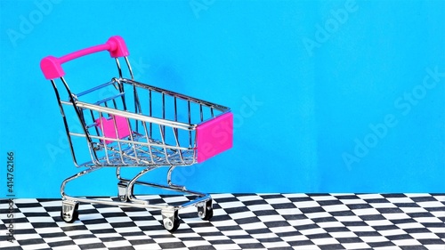 Shopping cart. Empty background space for the text label of the ad and the design.