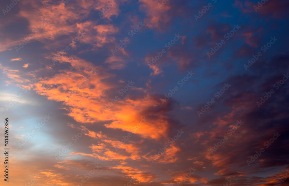 Clouds at sunset, amazing sky, nature background