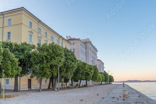 Sunrise view of Riva promenade in the historical part of Croatian city Zadar photo