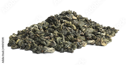 Pile of dried green tea leaves on white background