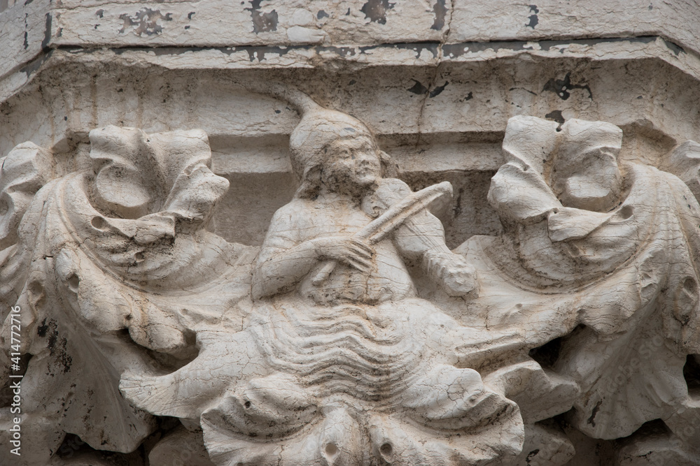 Doge's Palace in Venice, architectural detail capital, Italy, Europe.
