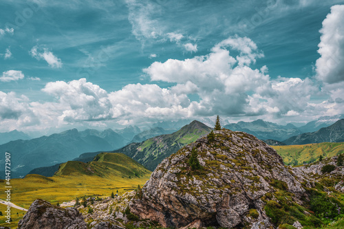 panoramic view of the Dolomites with beautiful weather clouds , Italy.