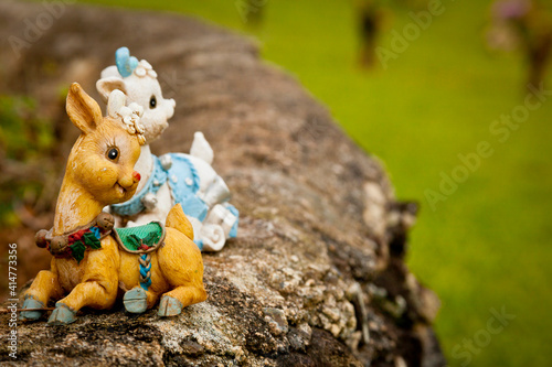 Souvenirs placed on a stone at the Hawaiian cemetery at the Valley of Temples, Oahu island, USA photo