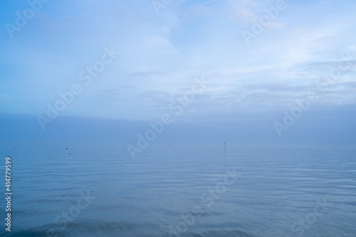 Fotografie, Tablou Cloudy blue minimalist seascape