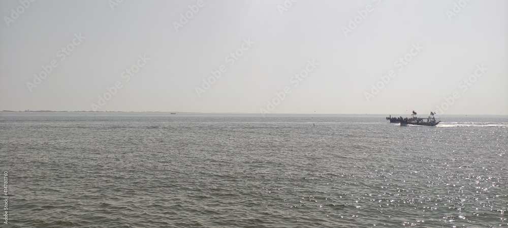 KARACHI, PAKISTAN - FEBRUARY 17, 2021: IMAGE TAKEN OF THE BEAUTIFUL SEA DURING DAY TIME IN KARACHI PAKISTAN.