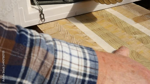 Topdown craftsman woodworking at carpentry with lot of modern professional power tools. Man using thicknessing planer machine, clamp joiner, circular saw and other equipment at workshop.hobby concept