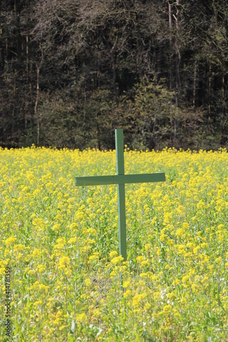 Green cross on a field in Germany