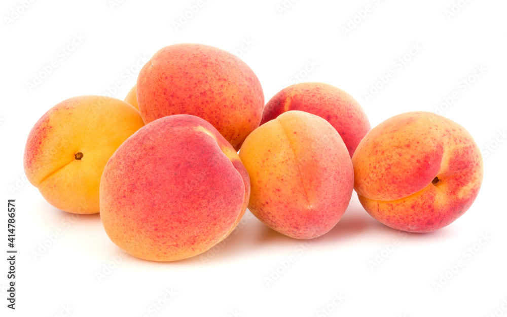 A bunch of apricot fruit isolated on white background cutout A bunch of apricot fruit isolated on white background cutout