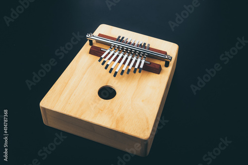 vintage acoustic Kalimba percussion music instrument, made from wooden, African traditional culture equipment photo