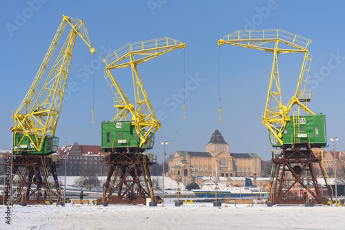 Szczecin, view of the waterfront and historic cranes.