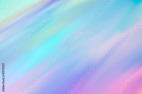 Holographic foil blurred abstract background for trendy design. Fantasy colorful card. Holographic sparkly cover with soft pastel colors