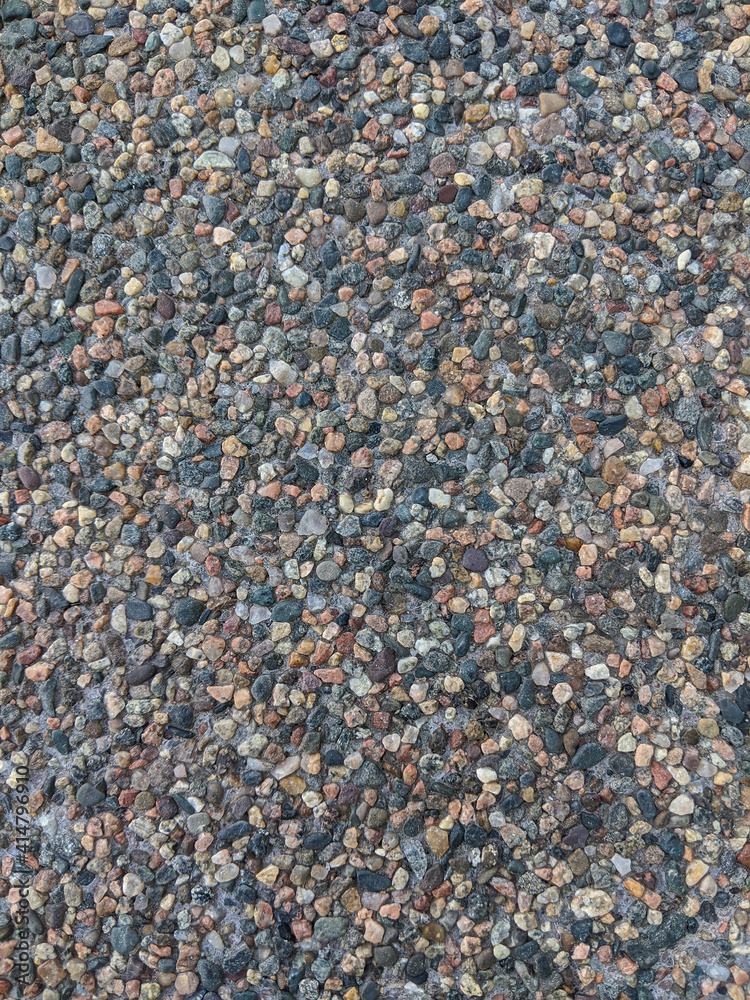 Background from small pebbles, abstract background for an inscription, banner and design. Background from small pebbles, abstract background for an inscription, banner and design.