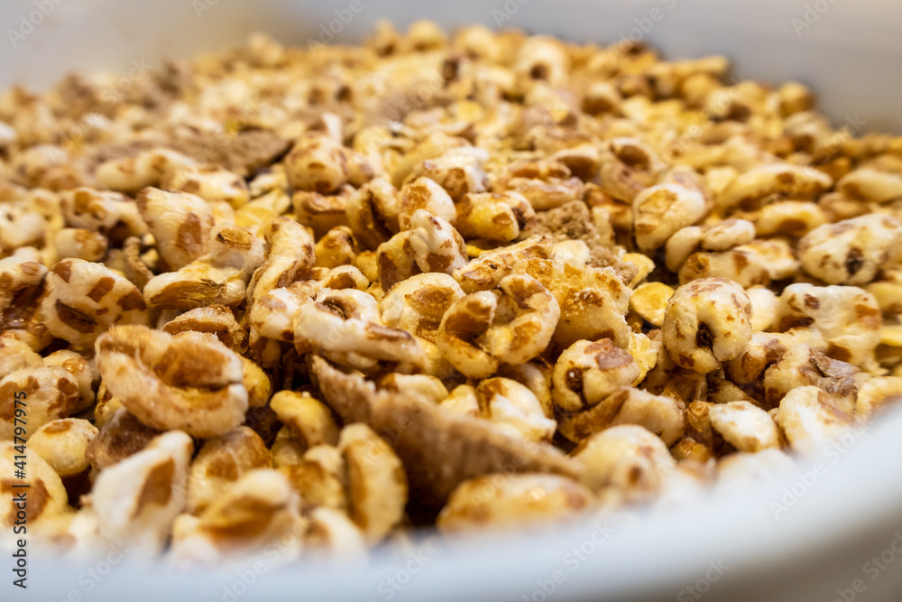 breakfast cereal in a bowl with spoon breakfast cereal in a bowl with spoon
