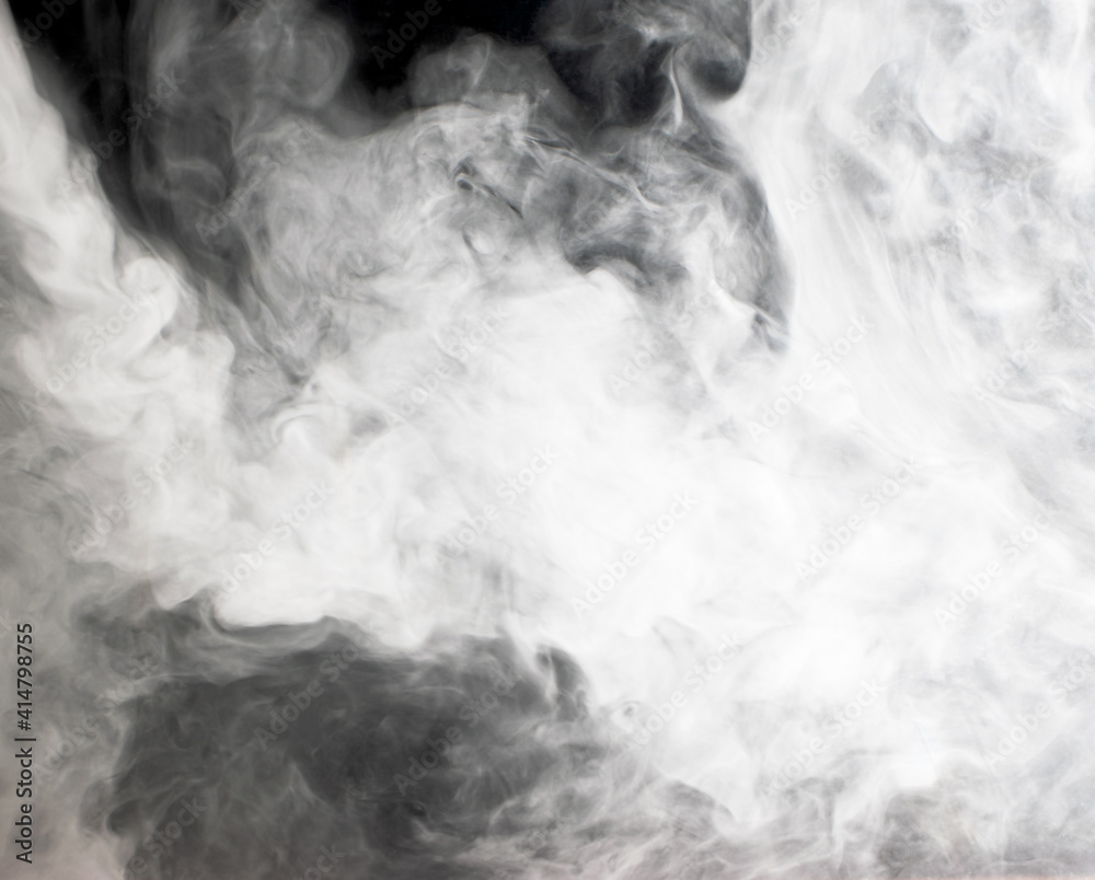 Abstract background of chaotically mixing clouds of white smoke against a background of darkness Abstract background of chaotically mixing clouds of white smoke against a background of darkness