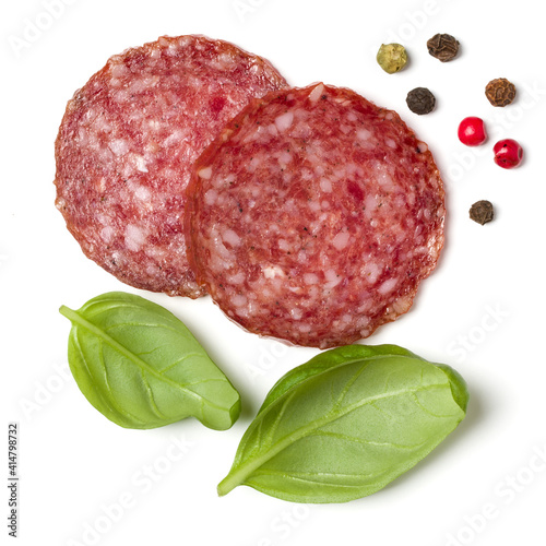 Obraz na płótnie Slices of salami isolated on white background closeup