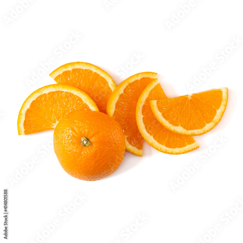 Orange fruit slice layout isolated on white background closeup. Food background. Flat lay, top view.