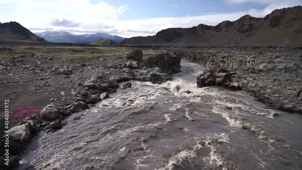 Smooth Innri-Emstrua river going from Waterfall. Laugavegur hiking trail Smooth Innri-Emstrua river going from Waterfall. Laugavegur hiking trail