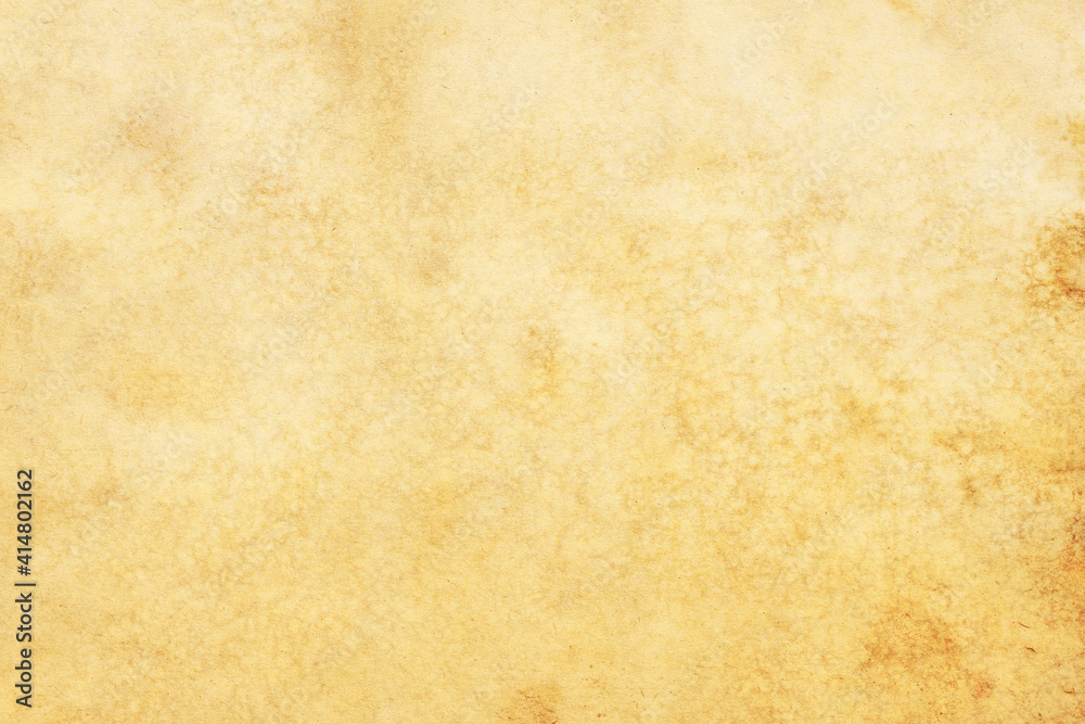Old brown yellow paper grunge background. Abstract liquid coffee color Old brown yellow paper grunge background. Abstract liquid coffee color
