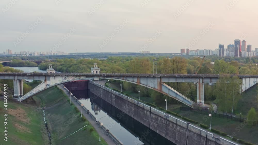 Drone flight under the railway bridge with a flight to the river Drone flight under the railway bridge with a flight to the river