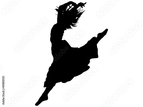 体を反らしてジャンプするバレエダンサーのシルエット