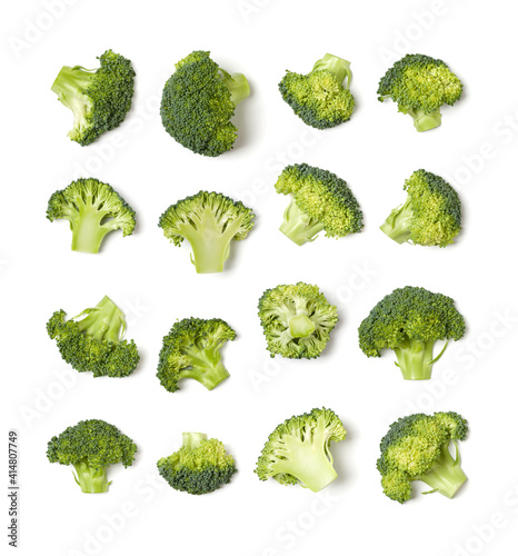 Creative layout made of broccoli. Flat lay, top view. Vegetables isolated over white background. Food ingredient pattern.