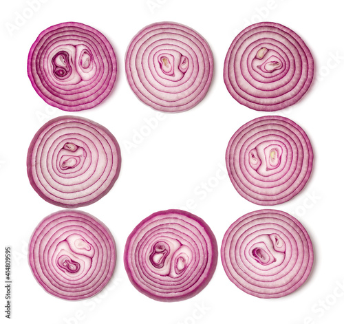 Creative layout made of onion slices. Flat lay, top view. Vegetables isolated on white background. Food ingredient pattern...