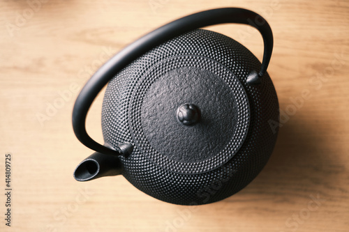 High angle view of a vintage Japanese cast iron kettle 