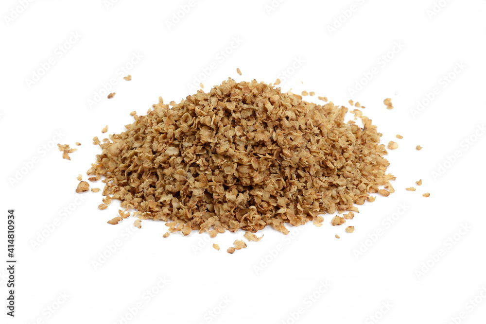 Buckwheat flakes isolated on white background. Healthy buckwheat flakes. Healthy food. Buckwheat flakes isolated on white background. Healthy buckwheat flakes. Healthy food.